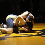 Homer&rsquo;s Richard Brock struggles to break free from Colony High School&rsquo;s Brandon Holmes during a wrestling match Thursday, Nov. 30, 2017 at the Alice Witte Gymnasium in Homer, Alaska. (Photo by Megan Pacer/Homer News)