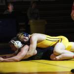 Homer&rsquo;s Levi King grapples with Colony High School&rsquo;s Simon Ganchenko during a dual match between the schools Thursday, Nov. 30, 2017 at the Alice Witte Gymnasium in Homer, Alaska. It was also senior night and the last time Mariner seniors wrestled at home for the season. (Photo by Megan Pacer/Homer News)