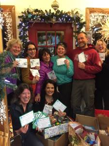 Store owners participating in the third annual Shop, Share and Win pose for a photo at the drawing for $50 gift certificates last Saturday at Classic Cook. From left to right standing in the back are Jenny Stroyeck, the Homer Bookstore; Becca Tufares, Oodalolly; Barb Scalzi, North Wind; Janie Bunzcak, The Classic Cook; Steve Veldstra, The Wagon Wheel, and Sue Post, the Homer Bookstore. Sitting in front are Claire Waxman, Homer Saw & Cycle, and Karen Shealy, Sea Glo. Other participating stores were Art Shop Gallery, Homer&rsquo;s Jeans, and Homer Animal Friends. The promotion raised $300 in donations and 300 pounds of food for Share the Spirit and the Homer Community Food Pantry. (Photo provided)