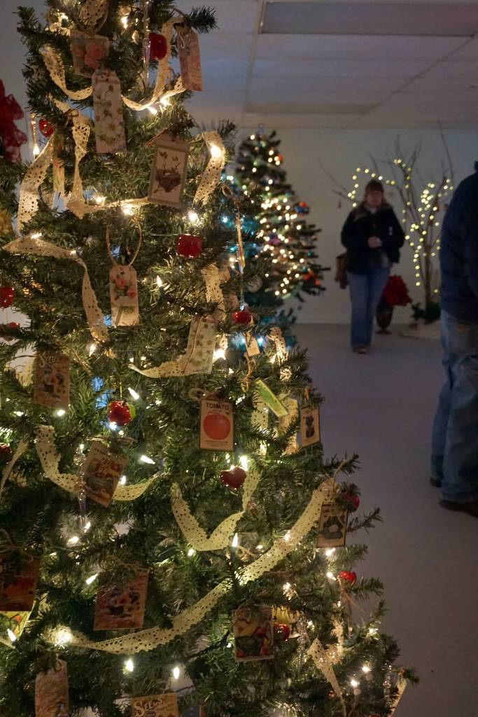 Seed packets adorn a Christmas tree decorated by the Homer Garden Club for a fundraiser Friday, Dec. 1, 2017 in Homer, Alaska benefitting South Peninsula Haven House. Local nonprofits decorated trees that were auctioned off in a silent auction at a space Haven House uses for special events on Bunnell Avenue. (Photo by Michael Armstrong, Homer News)