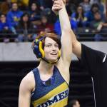 Homer senior Alex Moseley is crowned champion of the girls 120-pound division Saturday night at the Girls State Wrestling Championships at the Alaska Airlines Center in Anchorage. (Photo by Joey Klecka/Peninsula Clarion)