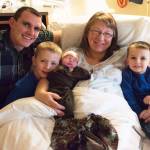 The Buzga family, from left to right: David, 5-year-old Blake, newborn Brooke, Jaimee, and 2-year-old Bradley, celebrate the addition to their family at South Peninsula Hospital. Brooke was the first baby born at the Hospital in the New Year, on Jan 4, 2018. (Photo by Katie Cannon)