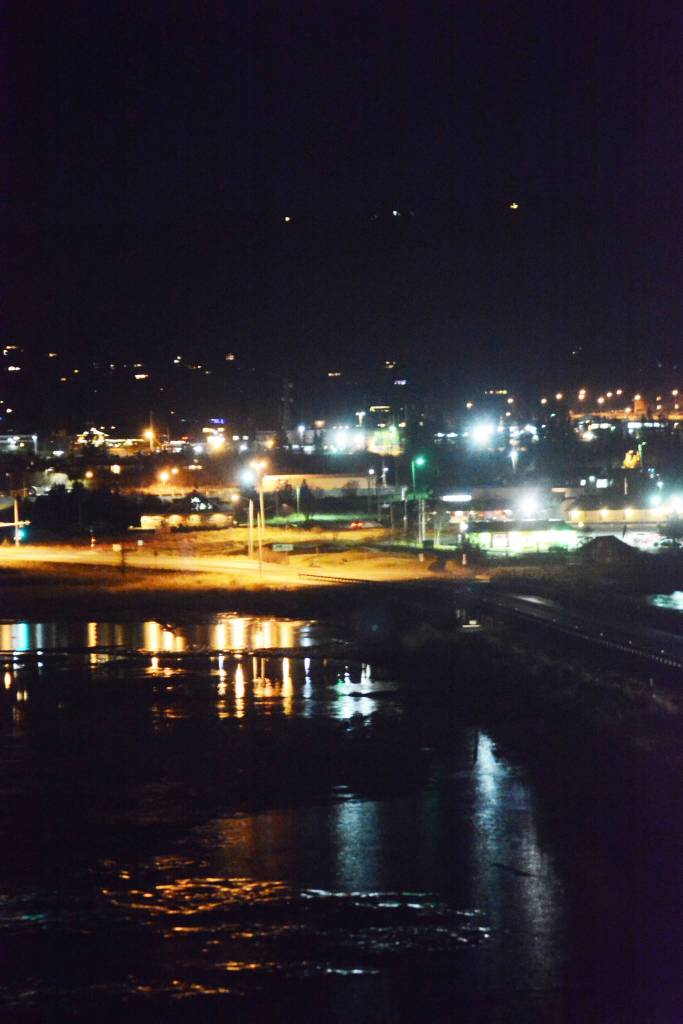 Bright lights, little city The city lights of Homer are reflected at high tide in Beluga Slough as seen from the deck of Beluga Lake Lodge last Thursday evening, Jan. 4 2018. (Photo by Michael Armstrong, Homer News)