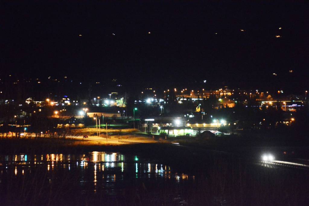 Bright lights, little city The city lights of Homer are reflected at high tide in Beluga Slough as seen from the deck of Beluga Lake Lodge last Thursday evening, Jan. 4 2018. (Photo by Michael Armstrong, Homer News)