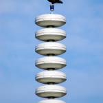 A bald eagle sits on top of a tsunami warning tower on the Homer Spit near Mariner Park on Tuesday morning, Sept. 2, 2014, after an error in the alert system caused a false tsunami warning. Towers like this situated in coastal Alaska towns are designed primarily to warn of tsunamis, but also can warn of other events, including possible nuclear missile attacks. (Homer News file photo by Michael Armstrong)