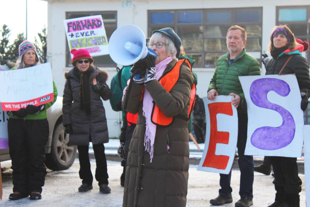 Sandy Garity, coordinator of the Women&rsquo;s March on Homer 2018, speaks to an assembled crowd of marchers shortly before they take off on their path through the town Saturday, Jan. 20, 2018 in Homer, Alaska. More than 600 men, women and children turned out to this year&rsquo;s march, which organizers said was focused on women&rsquo;s rights as human rights, and voter registration. (Photo by Megan Pacer/Homer News)