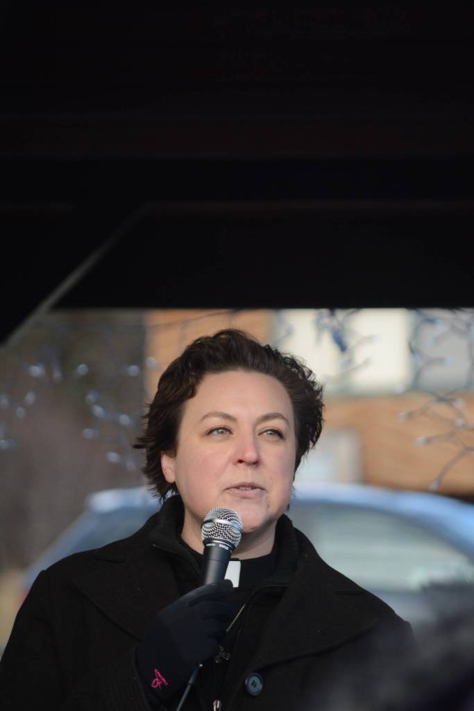 Pastor Lisa Talbott of Homer United Methodist Church speaks at the Homer March for Women on Saturday. Talbott held up a sign that read &ldquo;#MeToo&rdquo; and spoke about her experiences with sexual harassment and how she overcame them. &ldquo;Nevertheless, she persisted,&rdquo; Talbott said. &ldquo;My life story is a story of persistence. Just like you I had a life story.&rdquo; Talbott said she believes in the abundant life promised by Jesus Christ. &ldquo;The abundant life is not about fighting. It&rsquo;s about thriving,&rdquo; she said. About 700 people walked in the march along Pioneer Avenue on Jan. 20, 2018, in Homer, Alaska. The line of marchers extended from Main Street to Kachemak Way. (Photo by Michael Armstrong/Homer News)