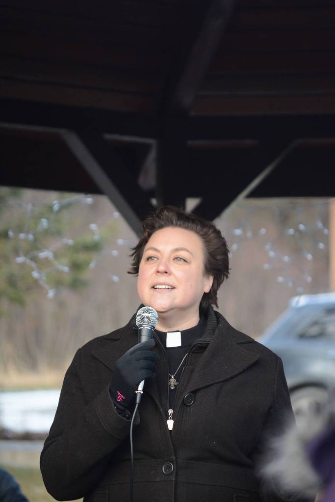 Pastor Lisa Talbott of Homer United Methodist Church speaks at the Homer March for Women on Saturday. Talbott held up a sign that read &ldquo;#MeToo&rdquo; and spoke about her experiences with sexual harassment and how she overcame them. &ldquo;Nevertheless, she persisted,&rdquo; Talbott said. &ldquo;My life story is a story of persistence. Just like you I had a life story.&rdquo; Talbott said she believes in the abundant life promised by Jesus Christ. &ldquo;The abundant life is not about fighting. It&rsquo;s about thriving,&rdquo; she said. About 700 people walked in the march along Pioneer Avenue on Jan. 20, 2018, in Homer, Alaska. The line of marchers extended from Main Street to Kachemak Way. (Photo by Michael Armstrong/Homer News)