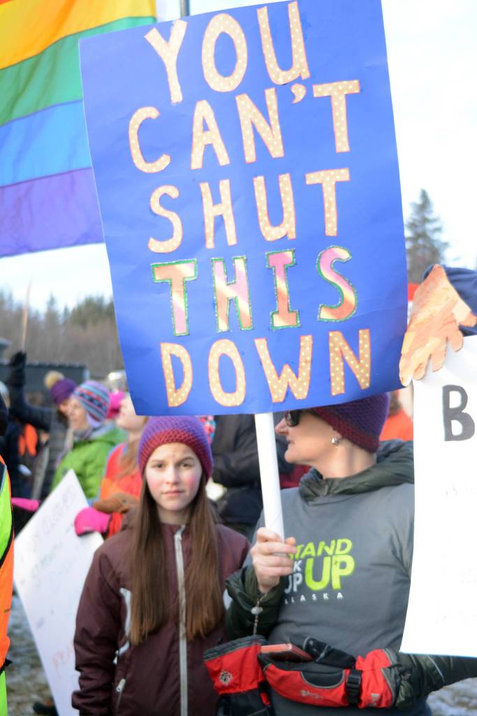 Former Homer City Council member Catriona Reynolds holds a sign in the Homer March for Women on Saturday. Reynolds survived an attempt to recall her from office in June 2017, winning with 56 percent of &ldquo;no&rdquo; votes. She chose not to run for re-election. About 700 people walked in the march along Pioneer Avenue on Jan. 20, 2018, in Homer, Alaska. The line of marchers extended from Main Street to Kachemak Way. (Photo by Michael Armstrong/Homer News)