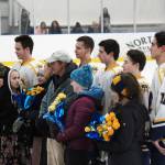 The five seniors on Homer High School&rsquo;s hockey team, Spencer Warren, Dimitry Kuzmin, Douglas Dean, Tim Blakely and Charlie Menke, pose with their parents during a senior night ceremony at their last home game of the season Thursday, Jan. 25, 2018 at the Kevin Bell Arena in Homer, Alaska. (Photo by Megan Pacer/Homer News)