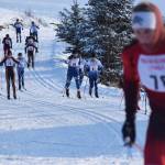 Kenai Central&rsquo;s Karl Danielson (78) leads a pack of boys varsity racers, including Soldotna&rsquo;s Josh Shuler (84) and Homer&rsquo;s Denver Waclawski (90) up an early hill Friday afternoon in the Kenai Klassic races at the Tsalteshi Trails in Soldotna. (Photo by Joey Klecka/Peninsula Clarion)