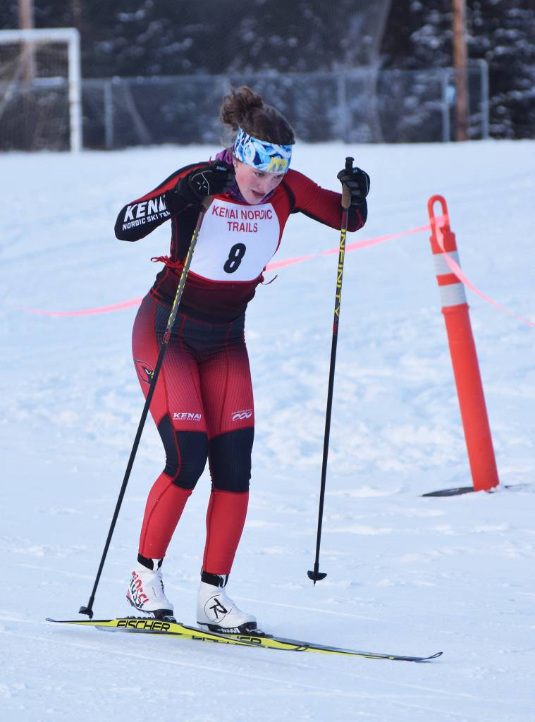 Kenai Central&rsquo;s Addison Gibson powers her way to the finish line Friday afternoon in the Kenai Klassic races at the Tsalteshi Trails in Soldotna. (Photo by Joey Klecka/Peninsula Clarion)