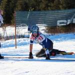 Homer&rsquo;s Denver Waclawski stands back up after sliding to the ground when he crossed the finish line of the varsity boys&rsquo; 5 kilometer skate ski race Saturday, Feb. 3, 2018 at the Lookout Mountain Ski Trails near Homer, Alaska. Waclawski raced Soldotna&rsquo;s Jode Sparks to a photo finish to claim sixth place. (Photo by Megan Pacer/Homer News)