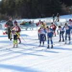 Skiers from Kenai Central High School, Soldotna High School, Homer High School and Seward High School take off from the starting line of the varsity girls&rsquo; 5 kilometer classic race Friday, Feb. 2, 2018 at an invitational at the Lookout Ski Trails near Homer, Alaska. (Photo by Megan Pacer/Homer News)