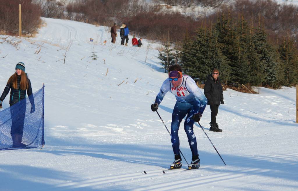 Soldotna&rsquo;s John-Mark Pothast skates into the finish line to take first place in the varsity boys&rsquo; 5 kilometer classic race Friday, Feb. 2, 2018 at the Homer ski invitational at the Lookout Trails near Homer, Alaska. (Photo by Megan Pacer/Homer News)