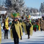 The Krewe of Gambrinus marches in the Homer Winter Carnival parade on Saturday. They won Best of Show in the parade contest. (Photo by Michael Armstrong, Homer News)