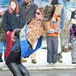 Daniel Boulton, who was crowned this year&rsquo;s Mr. Homer, dances along with the Krewe of Gambringus and the Bossy Pants Marching Band during the Winter Carnival parade Saturday, Feb. 10, 2018 down Pioneer Avenue in Homer, Alaska. (Photo by Megan Pacer/Homer News)