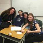 From left to right: Fireweed Academy teacher Hannah Snow, and students Elena Badajos, Frida Renner and Sylvia Clemens. Their team took second place in their age group at the district-wide Battle of the Books competition. Held across the nation each year, the program requires student teams to read several books and be ready to answer myriad questions about them in competition. (Photo submitted)