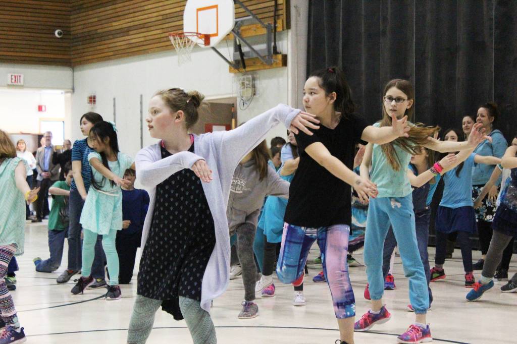 Students perform one o the dances they learned from Artist in the School resident Jocelyn Shiro during a recital for parents Friday, Feb. 23, 2018 at West Homer Elementary School in Homer, Alaska. (Photo by Megan Pacer/Homer News)