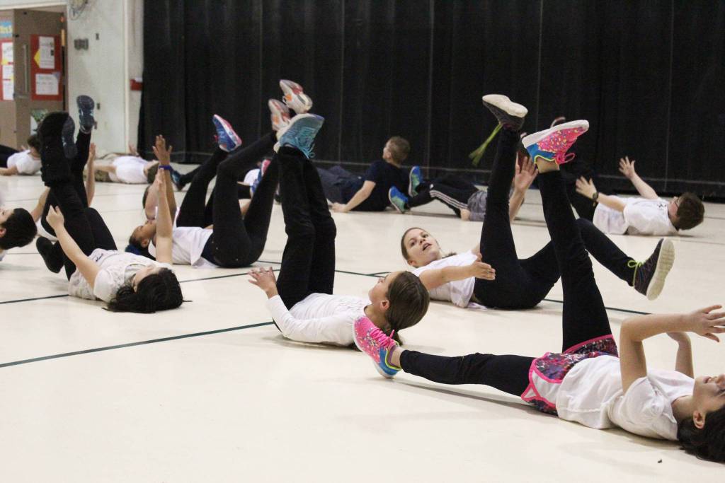Students perform one o the dances they learned from Artist in the School resident Jocelyn Shiro during a recital for parents Friday, Feb. 23, 2018 at West Homer Elementary School in Homer, Alaska. (Photo by Megan Pacer/Homer News)