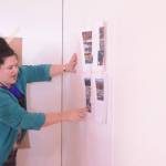 Artist in Residence Jaimie Warren, right, discusses her art project with Alex Franklin, left at her temporary studio at Bunnell Street Arts Center. The Brooklyn, New York, artist visits Homer this month. (Photo by Michael Armstrong, Homer News)