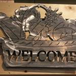 A piece of art created by Homer High School teacher Lauren Seaton hangs on display during a First Friday art show Friday, March 2, 2018 at Grace Ridge Brewery in Homer, Alaska. Works of art created by her Computer Aided Drafting and Computer Aided Manufacturing program students were the subject of the show. (Photo by Megan Pacer/Homer News)