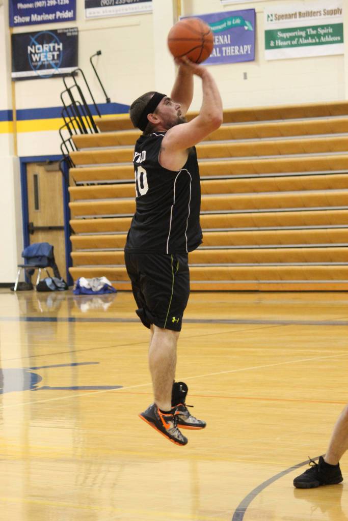 David Drake takes a shot for the Bay Weld Smooth Ops during the Homer city basketball league&rsquo;s championship game Monday, March 5, 2018 at Homer High School. (Photo by Megan Pacer/Homer News)