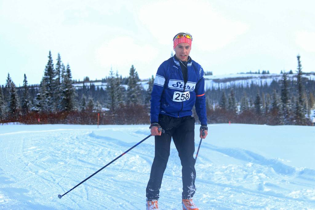 Bradley Walters, a sophomore on Soldotna High School&rsquo;s ski team, crosses the finish line to take first place in the 25 Kilometer race of this year&rsquo;s Kachemak Bay Nordic Ski Marathon on Saturday, March 8, 2018 at the McNeil Canyon Ski Area outside Homer, Alaska. (Photo by Megan Pacer/Homer News)