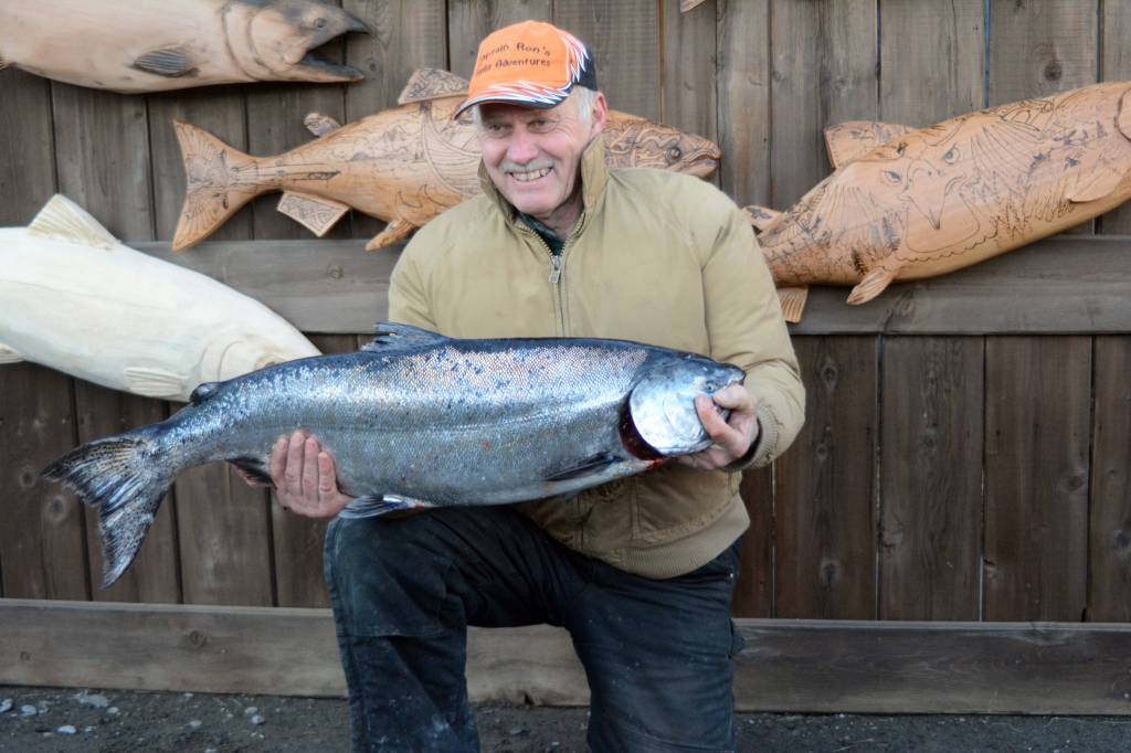Ron Johnson holds his winning king salmon of 25.65 pounds, at the 24th annual Homer Winter King Tournament on Saturday, March 23, 2017. One-thousand and 12 anglers registered in the tournament in 314 boats, catching 110 king salmon weighing 1,584 pounds total. Anglers also caught 27 white kings weighing 438 pounds total. (Photo by Michael Armstrong, Homer News).