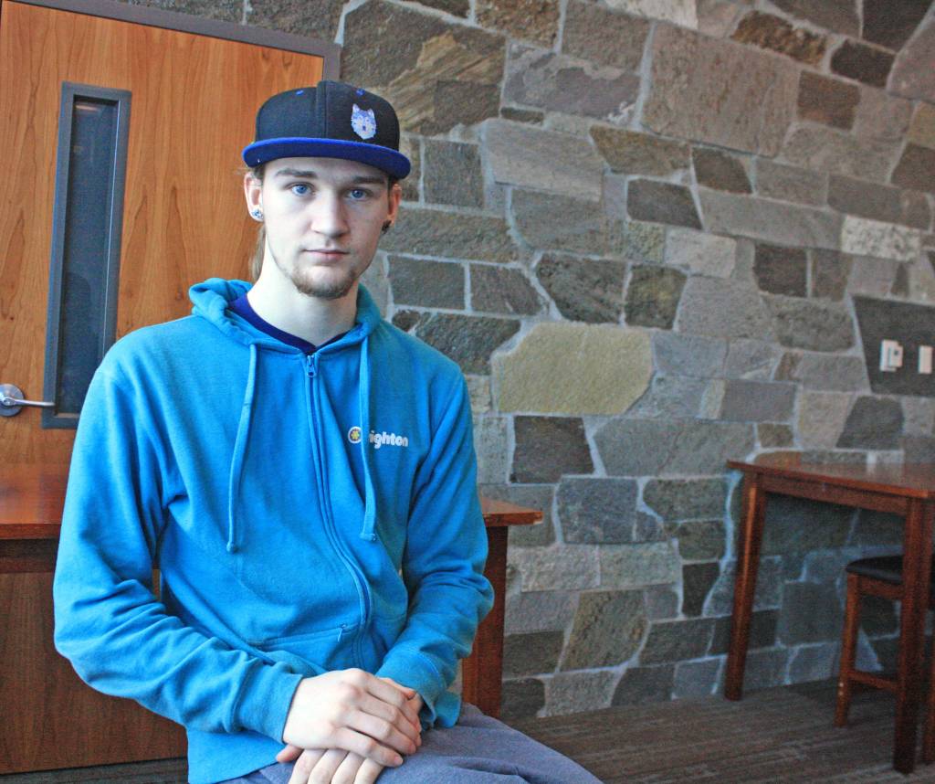 Kenai Central High School senior Will Brighton attends a public forum on gun safety on Saturday, March 10. Members of the public discussed a variety of topics at the forum, including ways to instill respect in students, drawing attention to the need for locking up guns through poster contests, media awareness campaigns, and offering support to at-risk kids. (Photo by Erin Thompson/Peninsula Clarion)