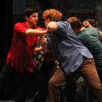 Homer High School students David Weisser (left) and Theodore Castellani (right) as the characters Bernardo and Riff, respectively act out a brawl scene from &ldquo;West Side Story&rdquo; during a dress rehearsal Tuesday, March 20, 2018 at the Mariner Theatre in Homer, Alaska. The musical is this year&rsquo;s production for the school&rsquo;s Concert Choir class, and and was last performed by the high school 15 years ago. (Photo by Megan Pacer/Homer News)
