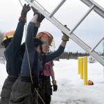 Randee Johnson, a senior at Kenai Central High School, participates in firefighter training at Nikiski Fire Station in Nikiski on Thursday. (Photo by Kat Sorensen/Peninsula Clarion)