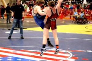 Photo submitted Wayne Newman takes Isaac Rodman of the Arctic Warriors Wrestling Club off his feet in a match Newman won 12-2 by technical fall at the Anchorage Freestyle Wrestling Club Tournament the weekend of March 31-April 1 in Anchorage.
