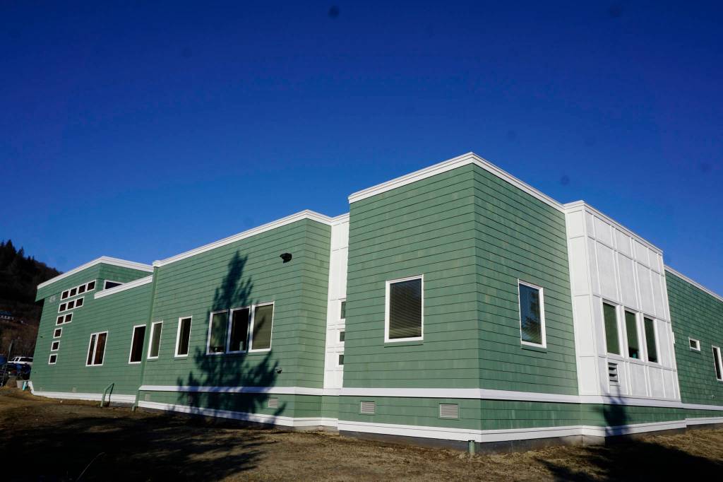 A tree casts a shadow on the expanded and remodeled Homer Medical Clinic last Friday, March 30, 2018 on Bartlett Street in Homer, Alaska. The South Peninsula Hospital Foundation commissioned and donated the painting to the clinic. (Photo by Michael Armstrong, Homer News)