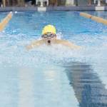 Photo by Lisa Linegar Willem Hakala swims across the pool during an invitational held by the Kachemak Swim Club on Friday and Saturday, April 6-7 at the Kate Kuhns Aquatic Center in Homer.