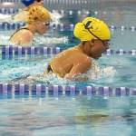 Michaela Browning swims the breaststroke during an invitational held by the Kachemak Swim Club on Friday and Saturday, April 6-7, 2018 at the Kate Kuhns Aquatic Center in Homer, Alaska. (Photo by Lisa Linegar)
