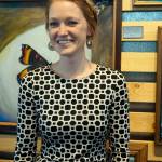 Britni Siekaniec stands by one of her paintings at the First Friday opening of her show, &ldquo;Salt,&rdquo; at Grace Ridge Brewery on April 6, 2018, in Homer, Alaska. (Photo by Michael Armstrong, Homer News)