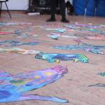 A mural made of animals painted on canvas and then cut out sits on the floor of Little Fireweed Academy&rsquo;s yurt during an art presentation and discussion Friday, April 13, 2018 at the School in Homer, Alaska. Ann Margaret Wimmerstedt guided the students through the mural making process through the Artists in Schools program. (Photo by Megan Pacer/Homer News)