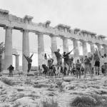 Photo provided Students from Michigan and Homer jump for joy during their recent trip to Greece in April.