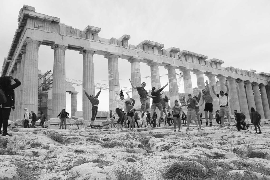 Photo provided Students from Michigan and Homer jump for joy during their recent trip to Greece in April.