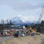 Photo by Michael Armstrong/Homer News Workers with Jay-Brant Construction, Homer, put in a coffer dam on Lake Street at Beluga Lake last Friday, May 4. The project will replace a gate system at the lake to better control water levels. Culverts also will be relined. Drivers can expect delays and one-lane traffic. Construction is scheduled to be done by mid-July.