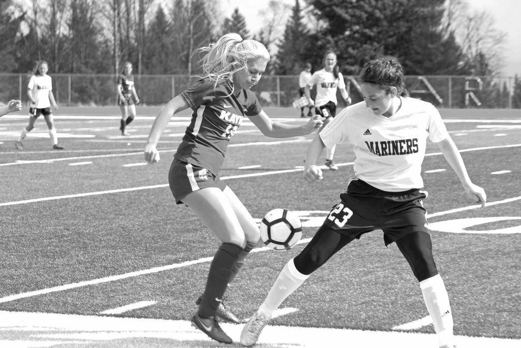 Photo by Megan Pacer/Homer News Ketchikan&rsquo;s Leah Benning battles for control of the ball with Homer&rsquo;s Rylyn Todd during their game Friday, May 4 at Homer High School. Ketchikan won the match 2-1.