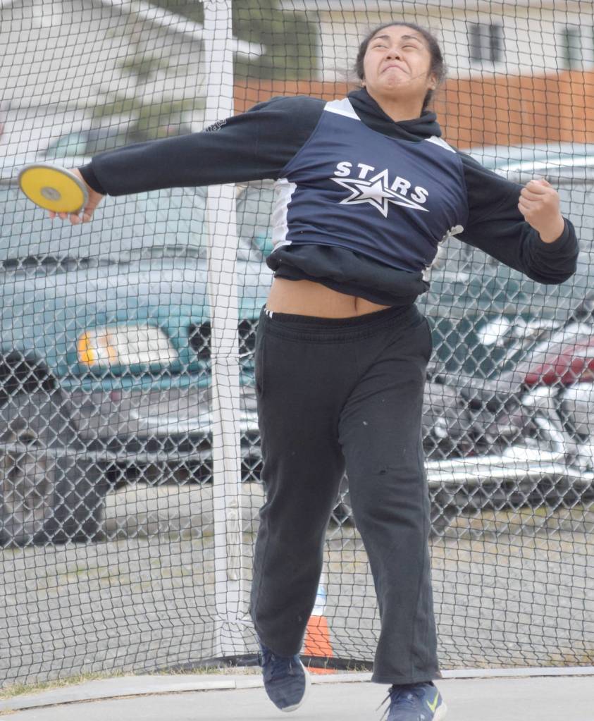 Soldotna&rsquo;s Ituau Tuisaula competes in the discus Saturday, May 12, 2018, in the Kenai Peninsula Borough track and field meet at Soldotna High School. (Photo by Jeff Helminiak/Peninsula Clarion)