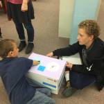 Zach and Andrew Marley work together at a discovery box during the last mentoring session of the year between students from Homer Middle School and Paul Banks Elementary School on Monday, May 14, 2018 at the middle school in Homer, Alaska. (Photo provided)