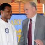 Walker talks budget fix during Homer visit