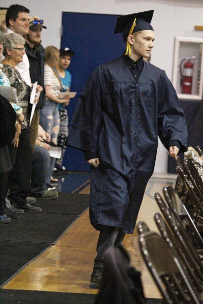 Ninilchik School graduate Nathanael Corey walks into his graduation ceremony Monday, May 21, 2018 at the school in Ninilchik, Alaska. Corey has enlisted in the U.S. Military as a fire support specialist. (Photo by Megan Pacer/Homer News)