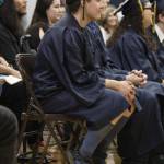 Ninilchik School graduate Joshua Wood listens to a speaker during his graduation ceremony Monday, May 21, 2018 at the school in Ninilchik, Alaska. Wood plans to enter the emergency medical response field. (Photo by Megan Pacer/Homer News)