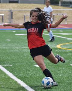 Kenai Central&rsquo;s Brenna Eubank winds up for a kick Saturday in the Peninsula Conference girls soccer championship at Soldotna High School. (Photo by Joey Klecka/Peninsula Clarion)