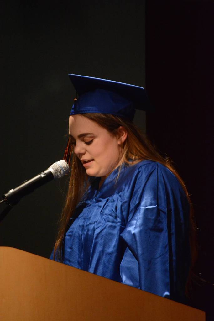 Flex High School graduate Ella Parks gives a speech thanking family, friends, teachers and staff. Nine students graduated from Flex on Tuesday night, May 22, 2018, at the Alaska Islands and Ocean Visitor Center auditorium, Homer, Alaska. (Photo by Michael Armstrong / Homer News)