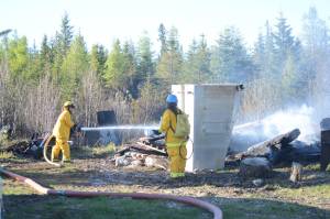 Firefighters save two East End Road homes from wildfire